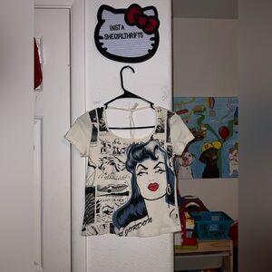 Y2K style comic book baby tee